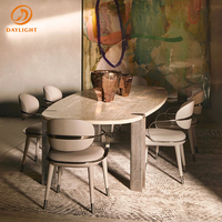 Ensemble de table à manger ovale de luxe en travertin beige avec pieds en acier inoxydable brun mat pour villa, maison, mobilier de manoir