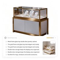 Vitrine de présentation de bijoux en verre LED de luxe moderne, en acier inoxydable robuste, couleurs personnalisables, finition polie