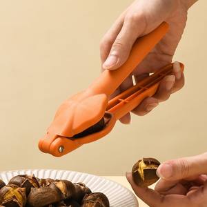 Herramienta para romper castañas, abridor de nueces de plástico naranja para castañas y nueces, utensilio de cocina multifunción - Product Image 1