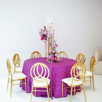Chaises Grace Bellini Phoenix empilables en acier inoxydable, disponibles en or et en argent, pour événements