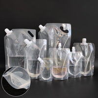 Vente en gros de logo personnalisable pochette à bec verseur en plastique PET/PE transparent jetable pour boisson, jus, eau et liquide
