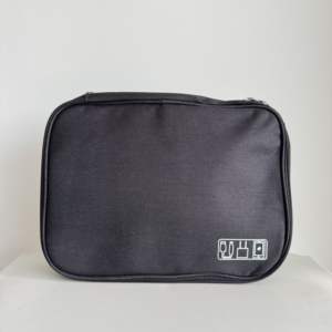 Bolsa de almacenamiento multifuncional para cable de datos, auriculares, cargador de energía, accesorios para teléfono móvil, rectangular, Oxford, minimalista, de viaje - Product Image 1