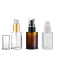 Bestseller Leere Runde 30ml 2oz Individuelle Farbige Klare Mattierte Glas-Kosmetikflasche für Creme Hautpflege Lotion mit Pumpspender