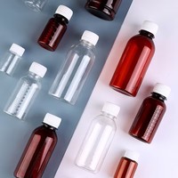 Bouteille ovale en PET ambré de qualité pharmaceutique avec échelle de précision pour le stockage résistant à la lumière des médicaments liquides et des sirops