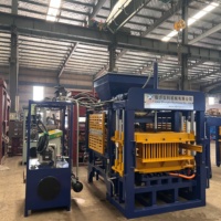 Machine à fabriquer des briques en béton QT4-15 pour les entreprises de fabrication de blocs commerciaux