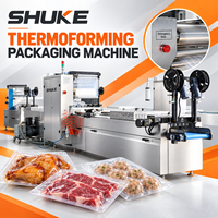 Machine de thermoformage pour l'emballage alimentaire de filets de poisson, de crevettes et de fruits de mer