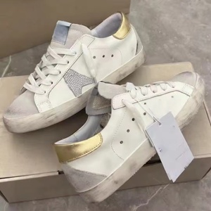 Chaussures de luxe de marque de créateur haut de gamme en cuir véritable et toile, style rétro éternel, avec étoile à cinq branches et amorti - Product Image 1