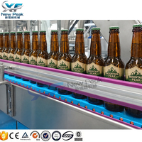 Nouvelle machine de remplissage et de bouchage de bouteilles en verre Peak Complete Bee pour l'embouteillage de bière en verre dans les usines de remplissage