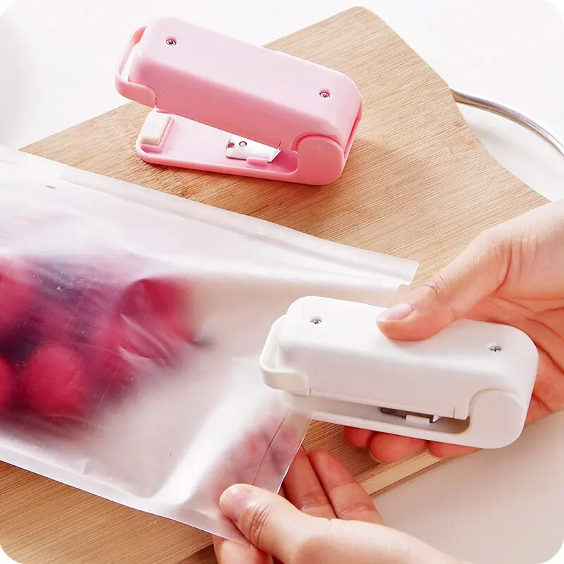 Termosigillatore portatile sacchetto di immagazzinaggio del pacchetto di plastica Mini sigillatrice pratico adesivo e sigilli per la cucina dello spuntino dell'alimento