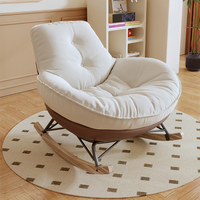 Fauteuil à bascule individuel en bois, style crème, design pingouin décontracté, avec assise en forme de coquille d'œuf, pour salon et chambre