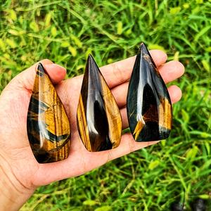 Vente en gros de pierres de cristal œil de tigre bleu et jaune en forme de larme, avec des inclusions et des cavités cristallines, pierre polie pour la décoration de la maison et du bureau - Product Image 3