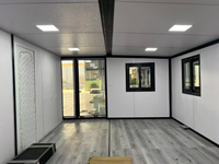 Maison conteneur extensible de 30 pieds, extérieur blanc, maison préfabriquée modulaire moderne pour habitation et projets