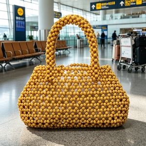 Bolso de madera original de estilo coreano, sencillo y versátil, con diseño calado y tejido artesanal de cuentas, ideal como bolso de playa. - Product Image 1