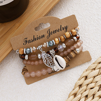 Bracelet Bohème Superposé Perles de Riz Colorées Coquillages Feuilles Bracelet de Luxe en Cristal et Pierres Géométriques pour Femme Cadeau
