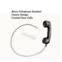 Combiné téléphonique public avec cordon métallique spiralé
