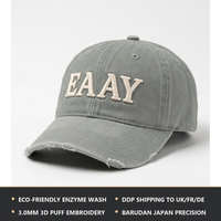 Gestileerde, gewassen Oxford baseballcap met distressed look, custom vintage gewassen katoen, 6 panelen, franje detail op de klep en aangepast logo.