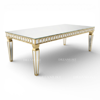 Table de salle à manger de luxe au design moderne en acier inoxydable durable avec plateau en verre trempé pour banquets d'hôtel et événements extérieurs