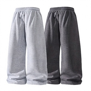 Pantalon de jogging évasé personnalisé pour homme, coupe ample et large, en polyester, avec logo et rayures, style streetwear premium - Product Image 1