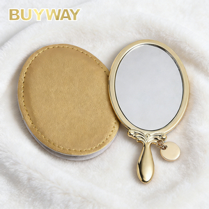 Miroir de maquillage portable compact ovale en nickel plaqué avec pochette en PU, poignée pendentif moderne, étui fantaisie personnalisé pour vanité - Product Image 1