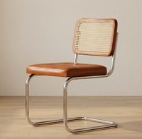 Chaises de salle à manger modernes à structure métallique avec revêtement en cuir, écologiques, durables, design de dossier incurvé, garantie 1 an, 2026