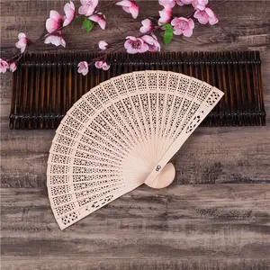 FINE OCEAN Wholesale Chinese Classical Hollow-out Carving Folding Wooden Fans For Live Performance Wedding Decoration Gift
