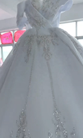 Robe de mariée de luxe élégante 2026 en dentelle perlée, coupe princesse, épaules dénudées, asymétrique, col en V, scintillante, pour mariées africaines