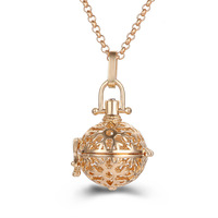 Collier porte-arôme parfumé plaqué or rétro tendance avec chaîne à maillons design creux pendentif parfum huiles essentielles unisexe