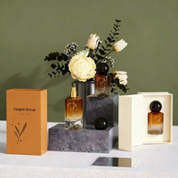 Flacon de parfum de luxe cylindrique haut de gamme en verre transparent doré de 30 ml avec fond facetté, tube personnalisé, boîte cadeau magnétique