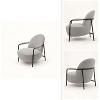 Fauteuil lounge moderne en tissu gris, fauteuil d'appoint rembourré avec cadre en métal noir, fauteuil de lecture à dossier bas pour salon