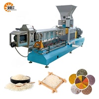 Machine d'extrusion de riz instantané nutritif, système de fabrication de riz instantané, usine de production de riz fortifié