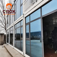Cbox Edificio de Oficinas Prefabricado en Paquete Plano, Habitaciones Modulares con Paredes de Vidrio, Espacio de Trabajo, Hotel, Villa, Casa Contenedor con Paneles Sándwich de Acero