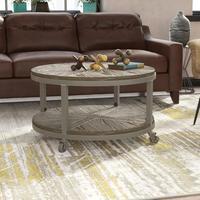 Table basse ronde en bois massif MAGI, style rustique industriel, avec roulettes