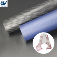 Dongguan Xionglin fabrica rollos de película de TPU de alta calidad para la parte superior de calzado deportivo.