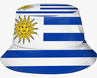En gros, souvenirs du drapeau ouguandais, ensembles de supporters de football, épingles, bracelets, écharpes, drapeaux de l'Uruguay pour la Journée nationale