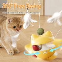 Nouveauté : Jouet interactif multifonctionnel tout-en-un pour chat, plateau tournant, distributeur de nourriture, jouet à bascule avec bâton à plumes