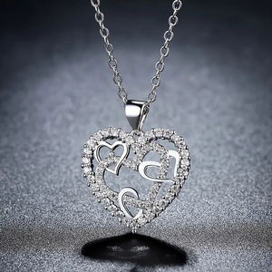 Collana con Ciondolo a Cuore Cavo, Gioiello Creativo con Charm a Battito Cardiaco Avvolto - Product Image 2