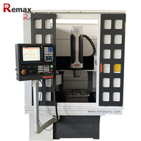 Machine de fraisage et de gravure CNC ATC à disque entièrement fermée 4040 pour le métal