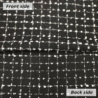 Tissu en tweed noir et blanc classique à carreaux 100% tissu polyester adapté à la fabrication de manteaux en stock