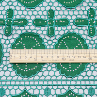 Fabricant de tissus jacquard blanc et orange écologiques avec broderie à œillets sur mesure pour la confection de robes en vente de gros
