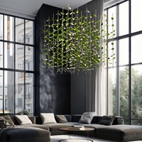 Lustre linéaire moderne ANNO, luminaire suspendu personnalisé avec un design de branche de feuille dorée pour hall d'hôtel de luxe