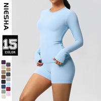 Nouvel ensemble de yoga long et moulant en Spandex/Nylon brossé, respirant, anti-plis, couleur unie, doux pour la peau, style européen et américain