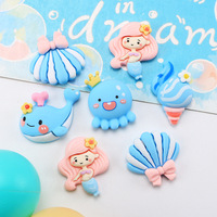 Accessoires de coque de téléphone de bonne qualité, style Océan Bleu, avec breloques en résine en forme de conque, pieuvre, sirène, coquillage et baleine