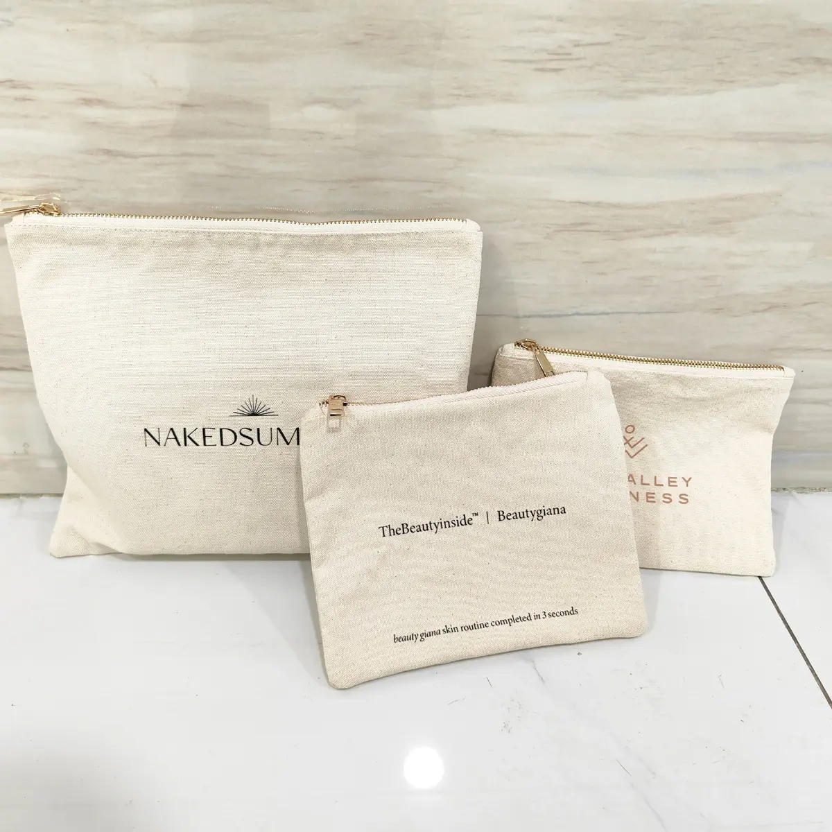 Bolsa con estampado de logotipo personalizado, bolsa de algodón Natural reciclada con cremallera dorada para productos cosméticos, bolsa de regalo para maquillaje