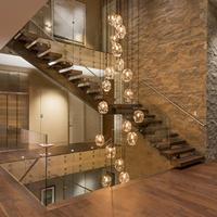 Escalier flottant droit à poutre unique en verre, moderne et de luxe, en métal, pour villa, appartement, hôtel