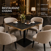 Ensemble table et chaises de bistrot en pierre frittée de luxe avec base en métal doré pour hôtel, café, restaurant, usage commercial