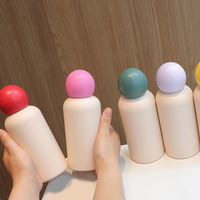 Bouteille d'eau sport pour enfants en acier inoxydable à isolation sous vide avec logo personnalisable, design résistant aux chutes, idéale pour un cadeau de remise de diplôme