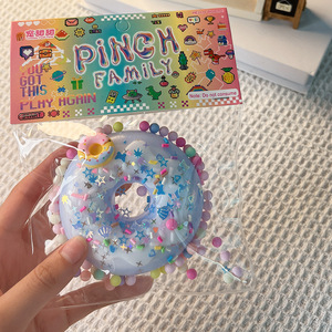 Juguete antiestrés de donut con cuentas de colores, regalo sensorial adorable con textura suave y atractivo estético moderno - Product Image 1