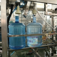 Machine de remplissage automatique de bouteilles d'eau liquide de 5 gallons (20 L) 150 BPH à haute efficacité