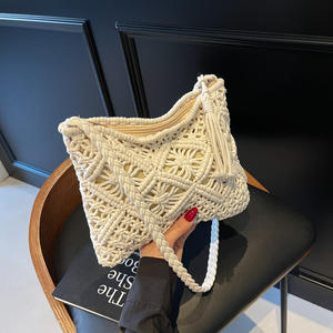 Nuevo bolso tejido de cuerda de algodón hecho a mano para mujer, bolso de playa de verano 2025 para mujer, bolso cruzado con diseño de flecos - Product Image 1
