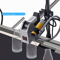Imprimante à jet d'encre TIJ en ligne Machine de codage d'étiquettes de date industrielle continue Boîte de bouteilles en PET